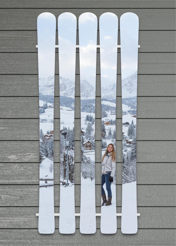 Vertical photo skis - photo of a woman on a ski hill